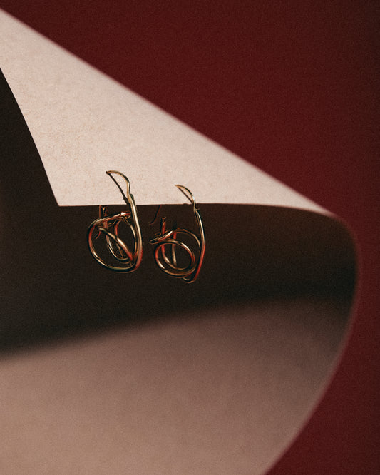 La Coquille Nautilus © Earrings – Coiled Brass Studs