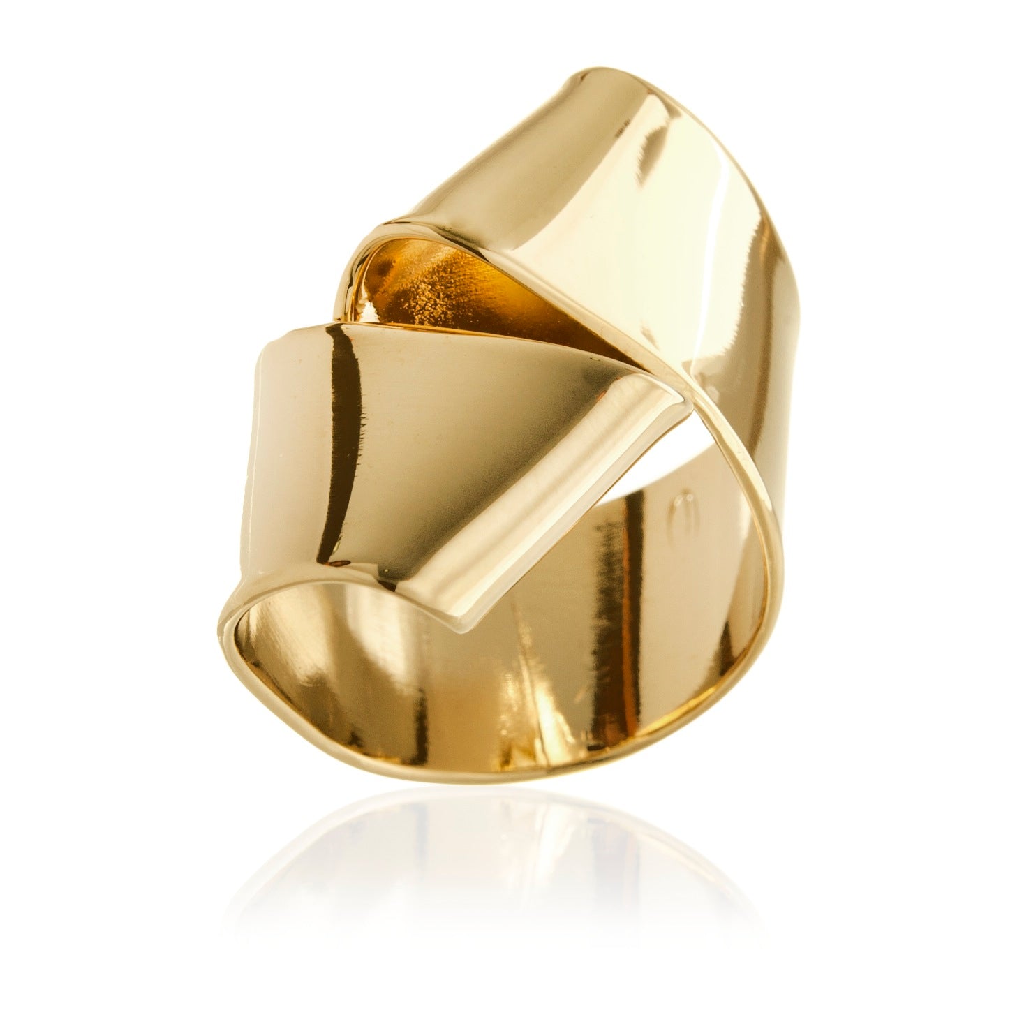 Bowtie is a hand formed ribbon resembling pasta that wraps around your finger.  It is fabricated in brass and finished in 14k gold plating