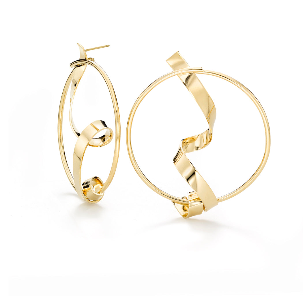 They are called Intersect because The Drawing Collection made out of wire and The Brass Band collection made out of sheet come together in this style. ~ 2.5" inches in diameter Post back earring Hand formed in brass and finished with 14k nickel free gold plating