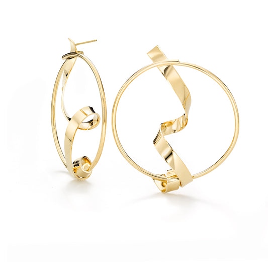 They are called Intersect because The Drawing Collection made out of wire and The Brass Band collection made out of sheet come together in this style.   ~ 2.5" inches in diameter  Post back earring  Hand formed in brass and finished with 14k nickel free gold plating