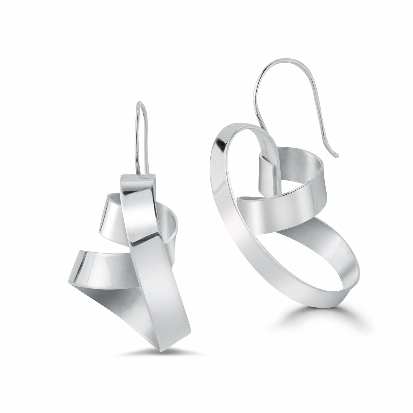 This is a beautiful and sensual earring in the Elemental collection. Made out of a continuous and wrapped strip of 5-6mm sterling silver sheet. Ear wire is integrated so it sits in the most perfect way from the ear.  The shape hugs the face  in such a complimentary way and you can choose which way the earring is worn.   Around 1.25-1.5" long depending on the coil, and about .5" wide  It is lightweight because it is hand fabricated out of sheet of sterling silver.