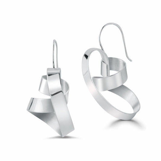 This is a beautiful and sensual earring in the Elemental collection. Made out of a continuous and wrapped strip of 5-6mm sterling silver sheet. Ear wire is integrated so it sits in the most perfect way from the ear.  The shape hugs the face  in such a complimentary way and you can choose which way the earring is worn.   Around 1.25-1.5" long depending on the coil, and about .5" wide  It is lightweight because it is hand fabricated out of sheet of sterling silver.