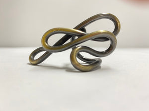 Flow patina ring