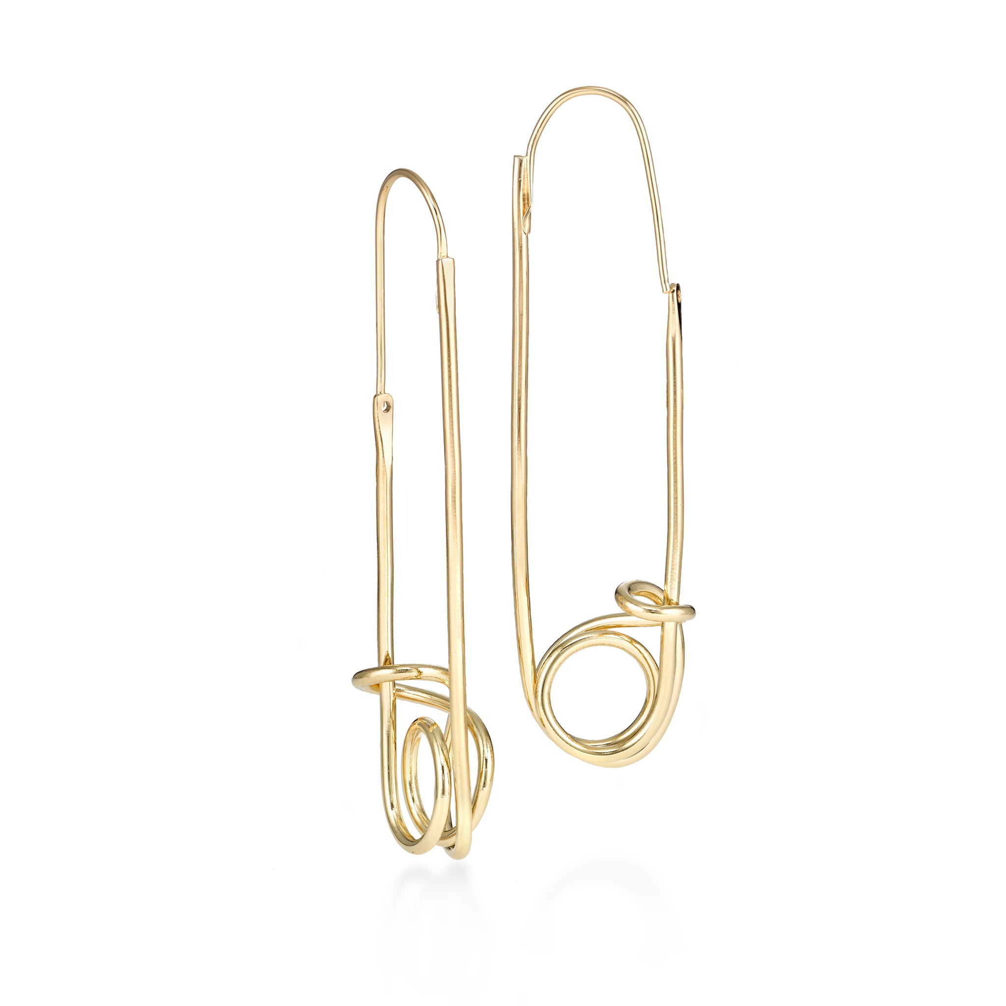 This earring is evocative of a safety pin. Wire moves to the side to enter the earlobe however  be gentle, we wanted to create a seamless design..  ~ 3" long   Hand fabricated in brass with 14k nickel free gold plating finish. 