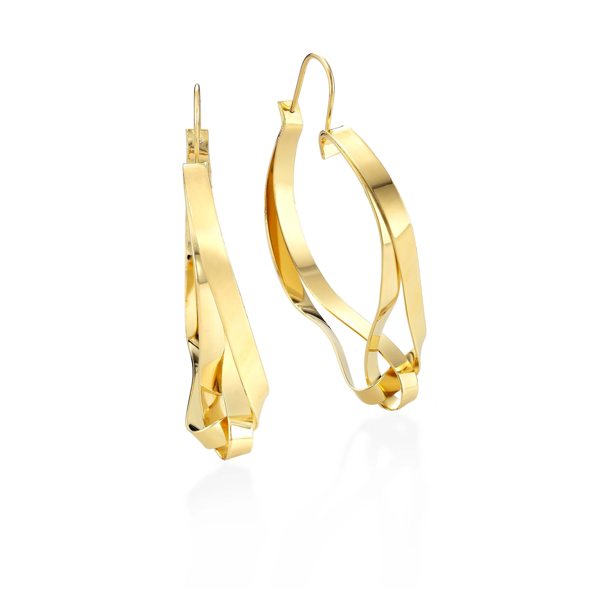 Oblik Atelier twisted ribbon hoop earring. Earring is hand formed in brass and finished in 14k nickel free plating. Formed out of fine metal ribbons so it's dramatic in size 2.5" by 1" but light to wear. Secure wire to the back.