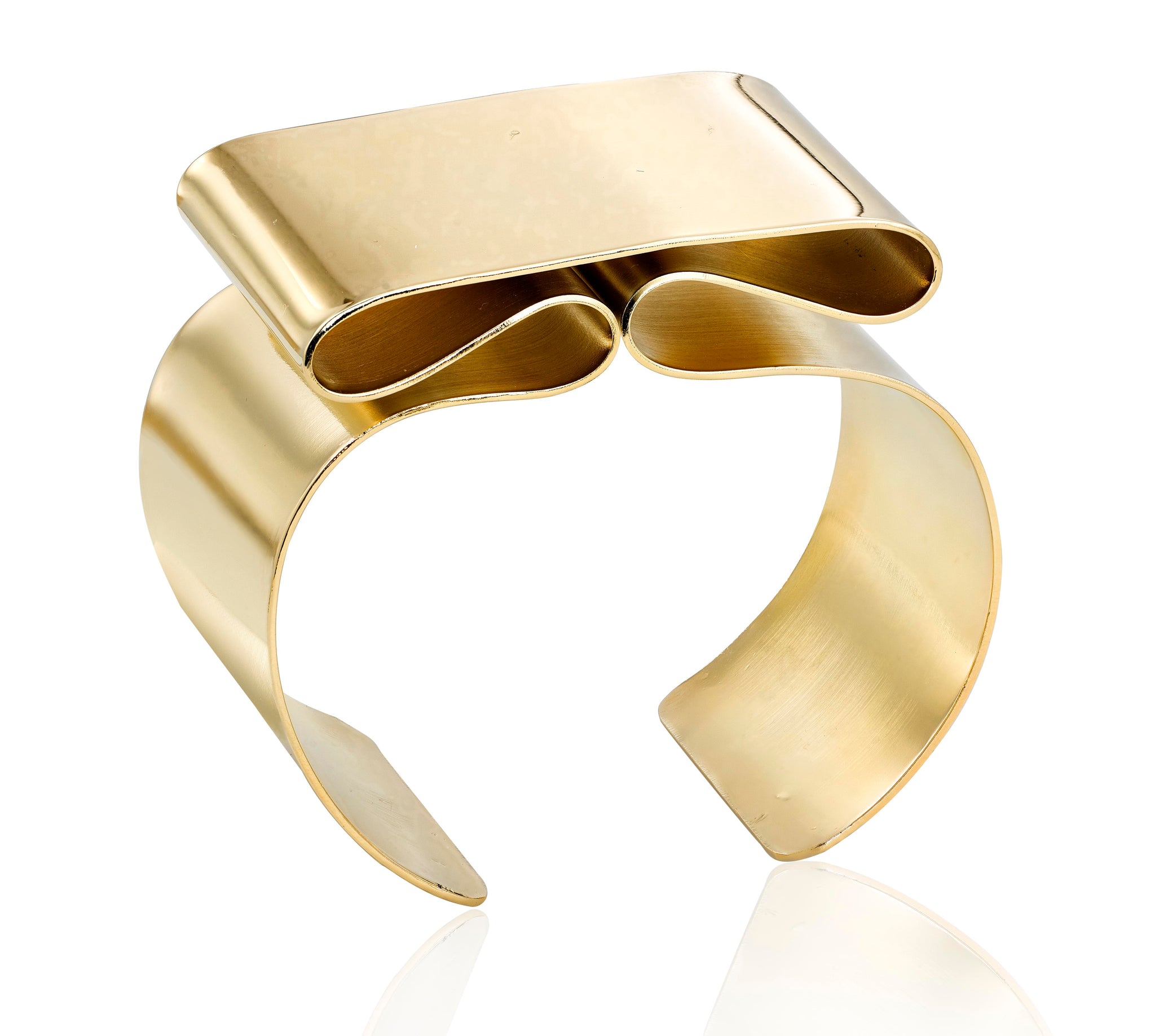This is a sleek, polished and an everyday cuff bangle bracelet.Each piece is hand formed, from a brass sheet. I named it Table mountain as it reminded me of the Australian mountain that has such an interesting flat top.   Bracelet is fabricated which means it can be easily adjusted to fit any wrist.   ~ 1.5" wide  ~ brass sheet, finished with 14k gold plating  ~ nickel free