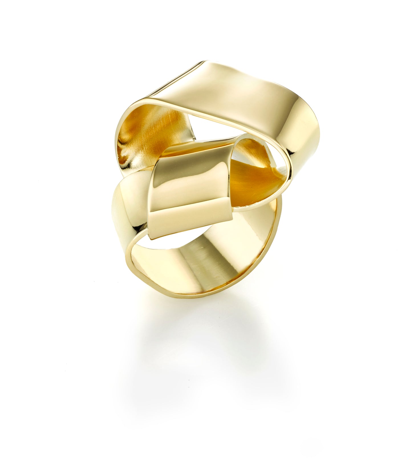 Would you like to wrap your finger with a wearable sculpture?  A small gift, Wrapped is a ribbon of metal wrapped around your finger. Very comfortable to wear as the piece is hand fabricated.  ~ about .5" wide and stands about .75" on top of your finger.  It is hand fabricated in brass and finished with nickel free 14k gold plating.  Also available in sterling silver