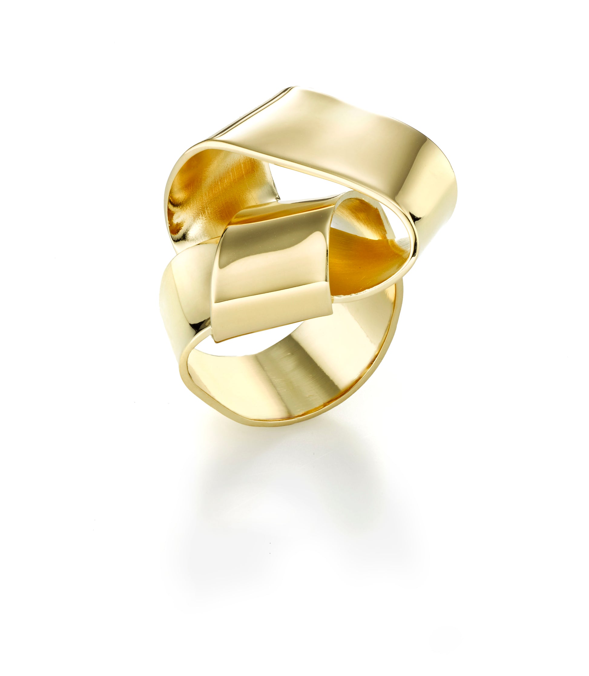 Would you like to wrap your finger with a wearable sculpture?  A small gift, Wrapped is a ribbon of metal wrapped around your finger. Very comfortable to wear as the piece is hand fabricated.  ~ about .5" wide and stands about .75" on top of your finger.  It is hand fabricated in brass and finished with nickel free 14k gold plating.  Also available in sterling silver