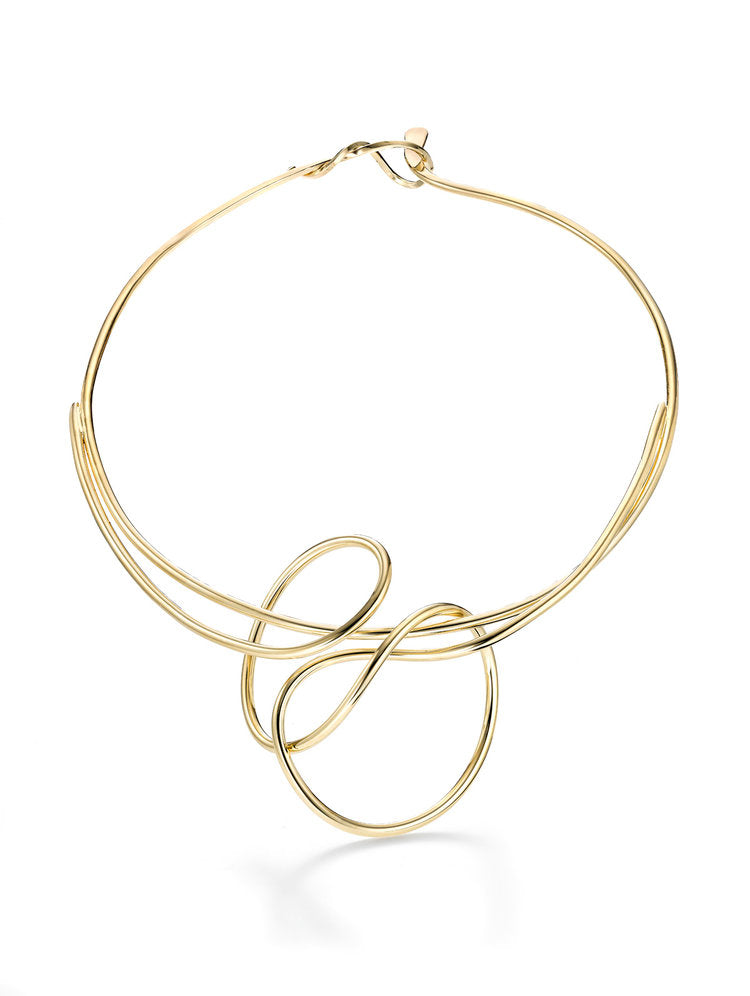 Hand bent gold plated brass wire necklace. This was an exercise in controlled chaos! This collar/pendant necklace is feminine, sculptural unique piece of jewelry! This is a simple elegant piece that is light and easy to wear and sits around the most sensual part of woman's body, and that is her collar bone.  It is hand formed out of 3mm thick wire.The central section is about 3-4" wide, it's free form so it's not an exact size. 