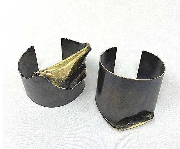 Wither is a Hand formed, hammered brass cuff bracelet finished with patina treatment.  Every cuff is cut and hammered by hand so each is slightly different in the fold and shape.  Sides are 1.75” wide and the section with the hammer and fold is around 2”.  its easily formed by hand so you can adjust the size to fit your wrist.  Gorgeous wearable sculpture for your hand.  Handmade in Brooklyn, NY