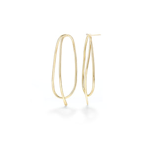 This earring design  is loosely based on our logo as I always loved the simplicity of this shape and thought it could become something more than just a line drawing. Airy and beautiful as the curves compliment the face...  ~2.5" long  ~ post in the back is hidden behind the wire  Hand fabricated in brass wire and finished with 14k nickel free gold plating  Available in sterling silver 
