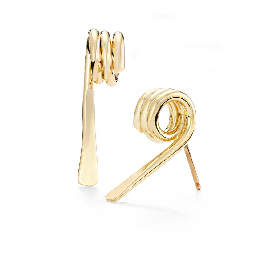 One of the smallest stud earrings in the Drawing Series collection ~1/2 in length and about 1/4" in width.   Beauty is in their asymmetry. They are each hand coiled and fabricated in brass wire and finished with 14k nickel free gold plating.  Also available in sterling silver.